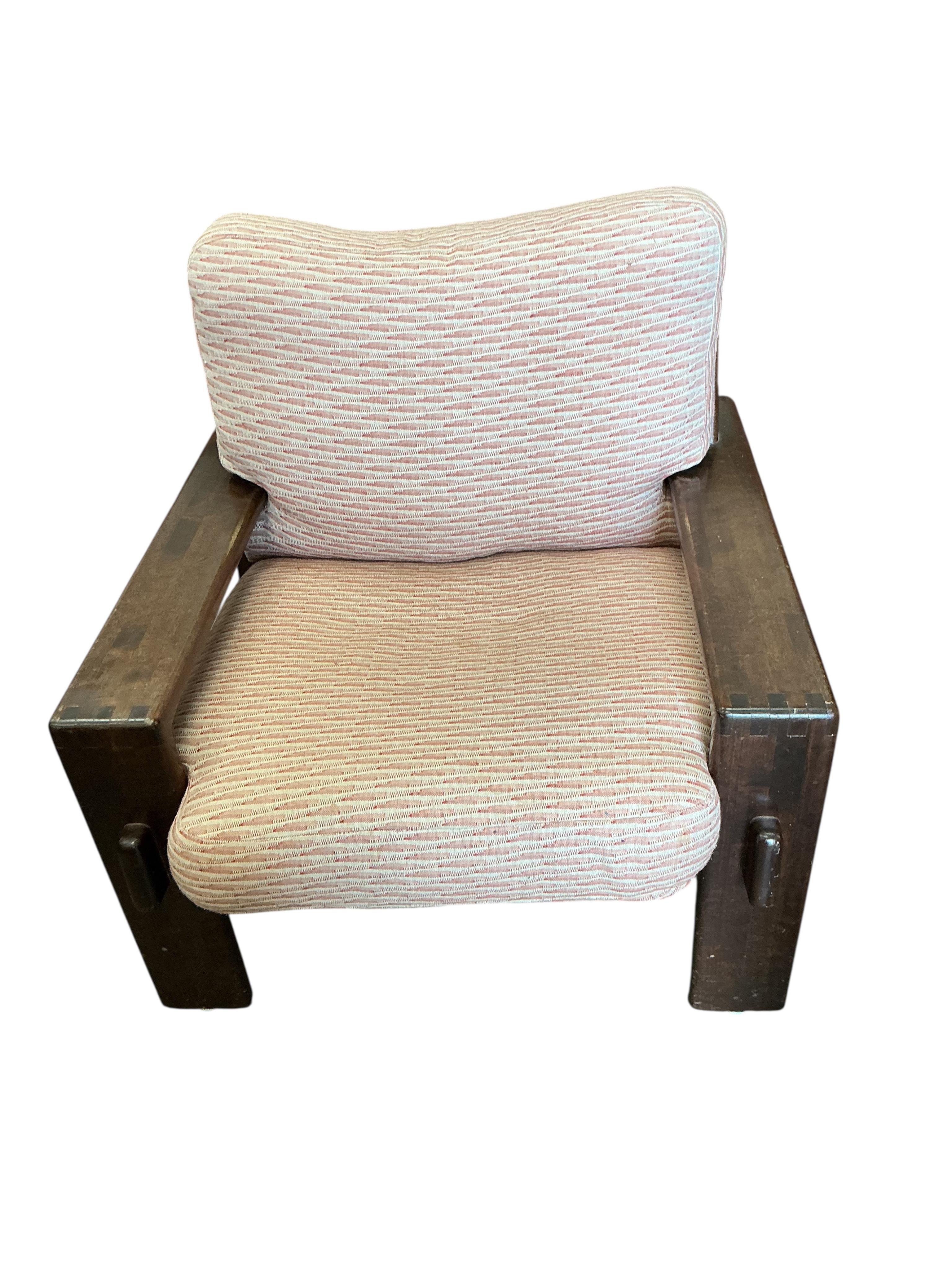A pair of Arts & Crafts style walnut armchairs with loose cushion seats and backs, width 80cm, depth 80cm, height 85cm